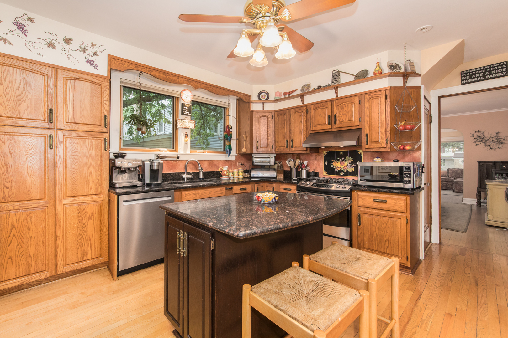 1605 South Fairview Avenue Park Ridge, IL 60068 - Photo 8 of 31 a kitchen with stainless steel appliances granite countertop a sink stove and refrigerator