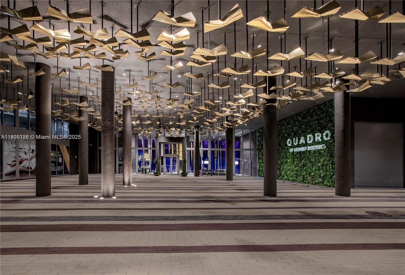 a view of a building with a fountain