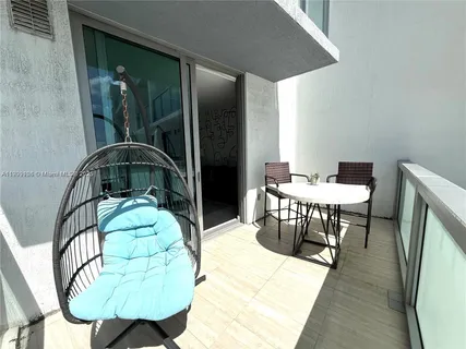 a bedroom with a bed and a mirror