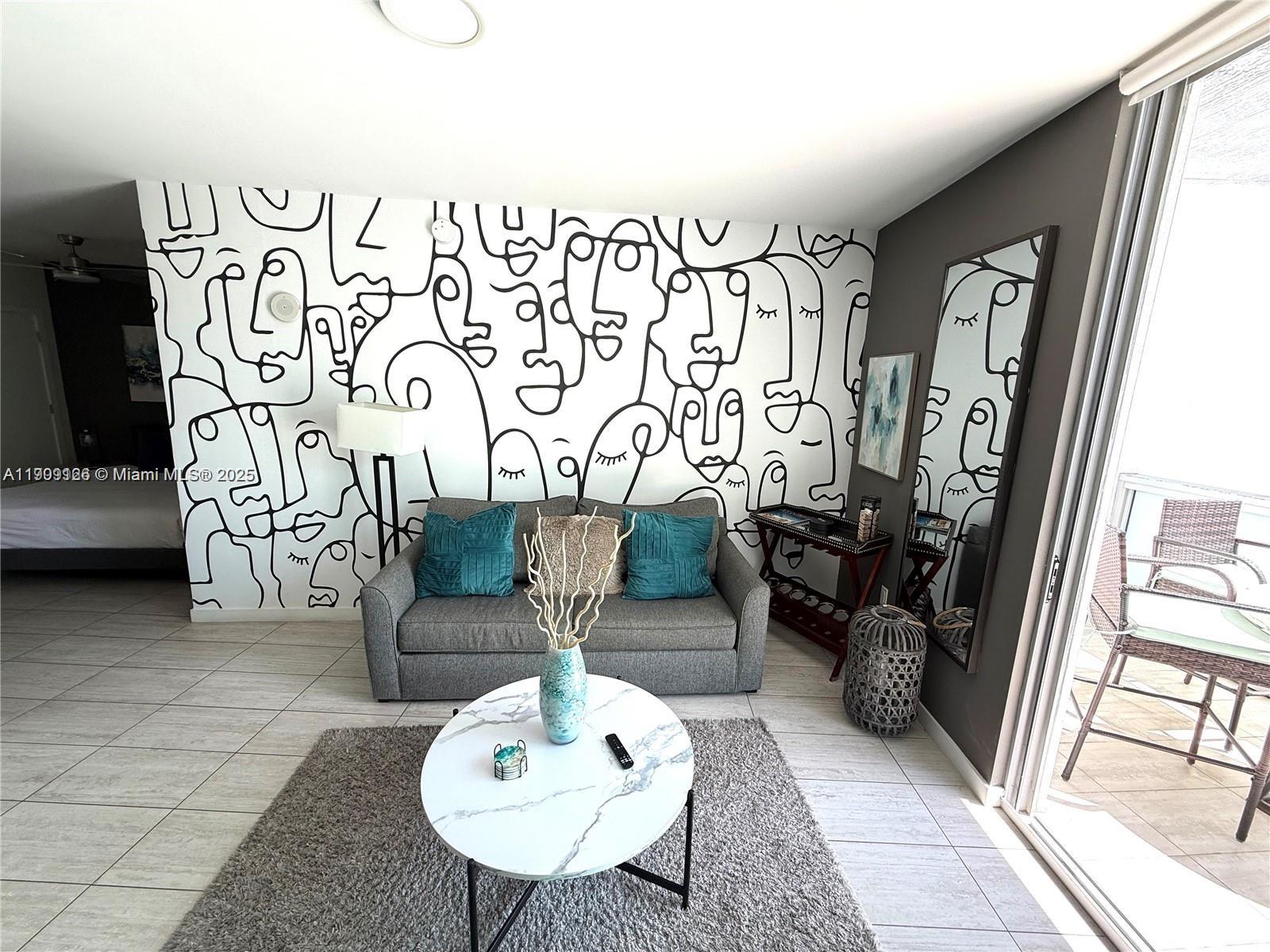 3900 Biscayne Boulevard, Unit N723 Miami, FL 33137 - Photo 9 of 30 a living room with furniture