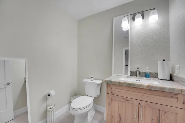 a view of swimming pool with outdoor seating