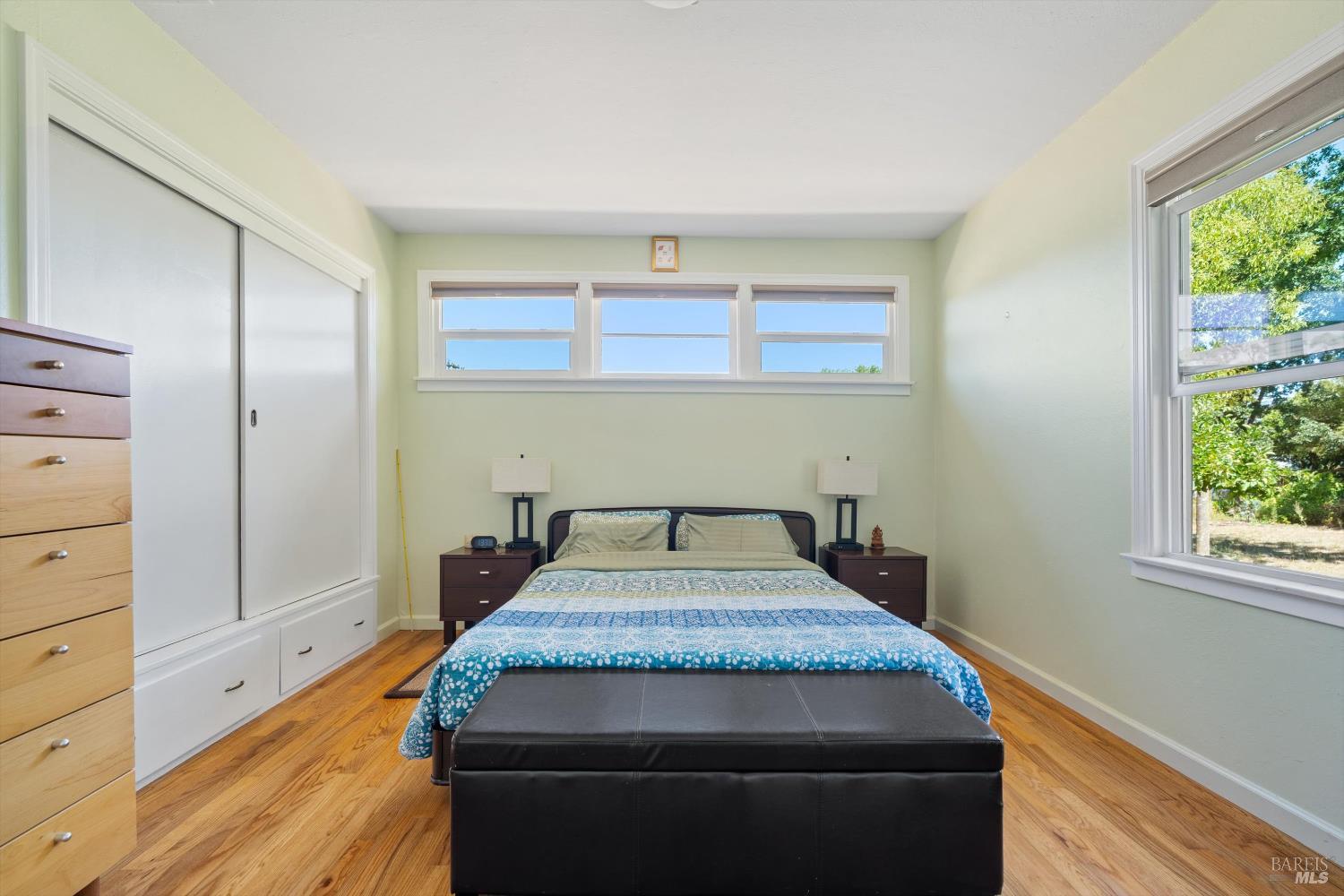 644 Piezzi Road Santa Rosa, CA 95401 - Photo 17 of 63 a bedroom with a bed and a window