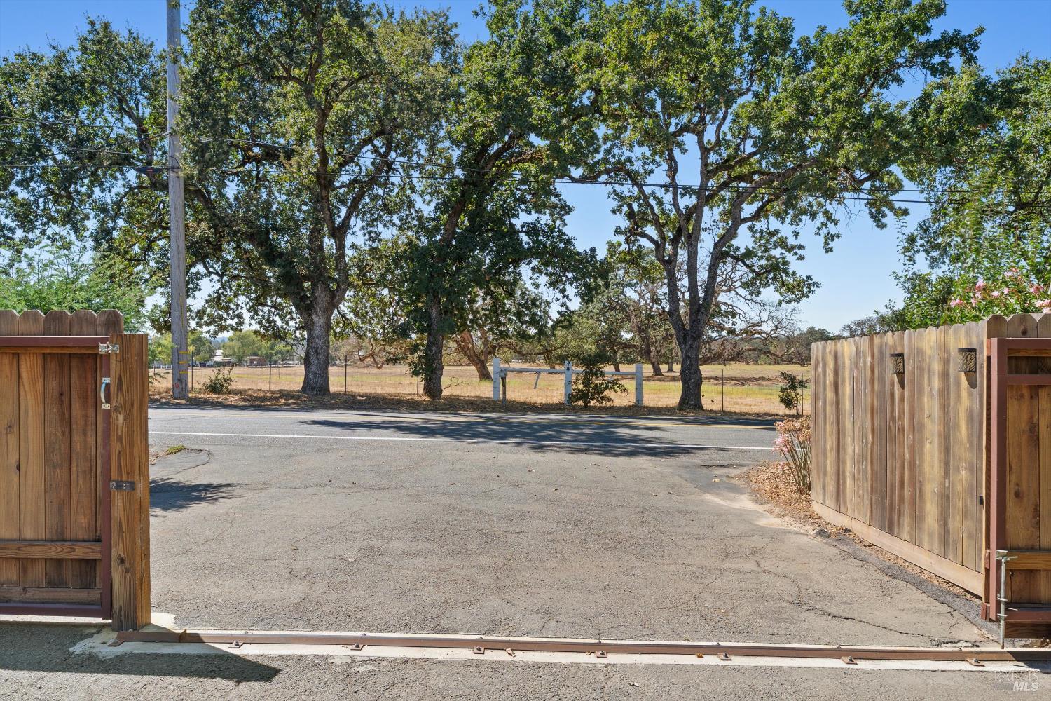 644 Piezzi Road Santa Rosa, CA 95401 - Photo 22 of 63 a view of a yard with wooden fence