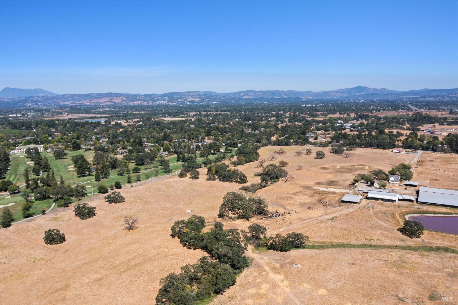 644 Piezzi Road Santa Rosa, CA 95401 - Photo 61 of 63 an aerial view of a house with a yard