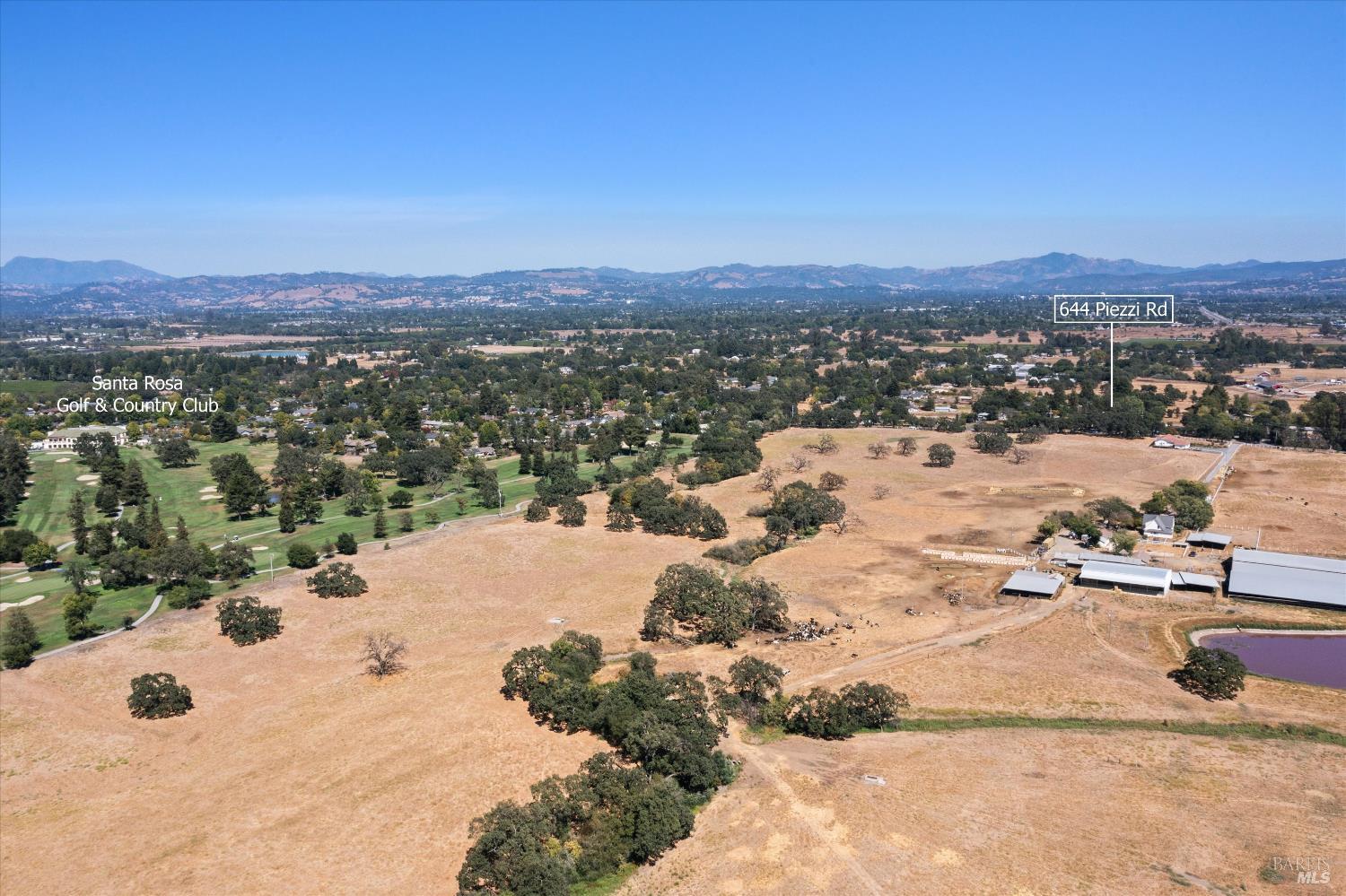 644 Piezzi Road Santa Rosa, CA 95401 - Photo 63 of 63 an aerial view of a house with a yard
