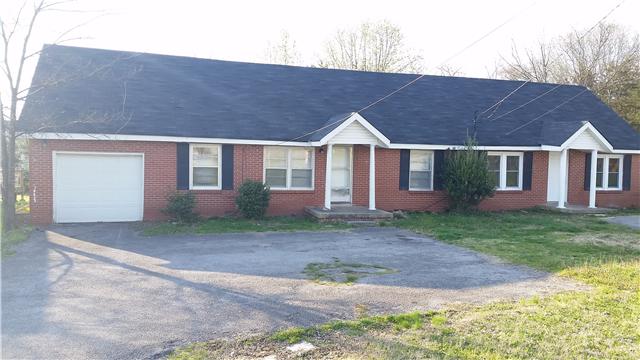 3248 Anderson Road Antioch, TN 37013 - Photo 1 of 17 a front view of a house with garden