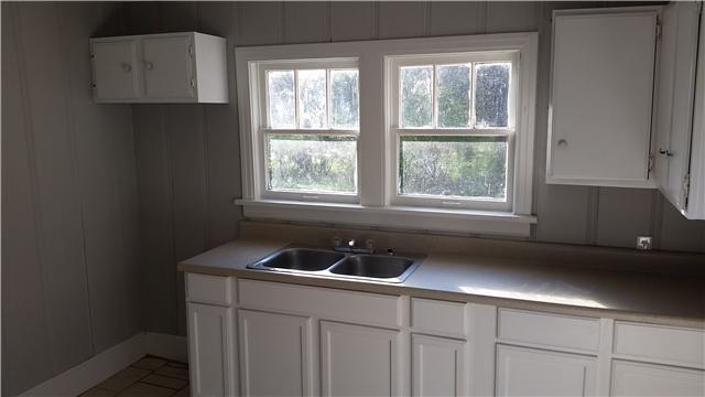 3248 Anderson Road Antioch, TN 37013 - Photo 4 of 17 a kitchen with a sink a window and cabinets
