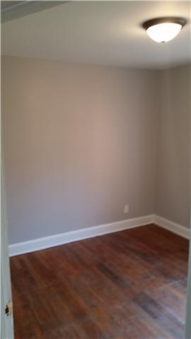 3248 Anderson Road Antioch, TN 37013 - Photo 6 of 17 a view of an empty room with wooden floor