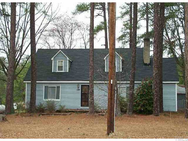 3509 Cheek Road Durham, NC 27704 - Photo 1 of 1 a front view of a house with garden