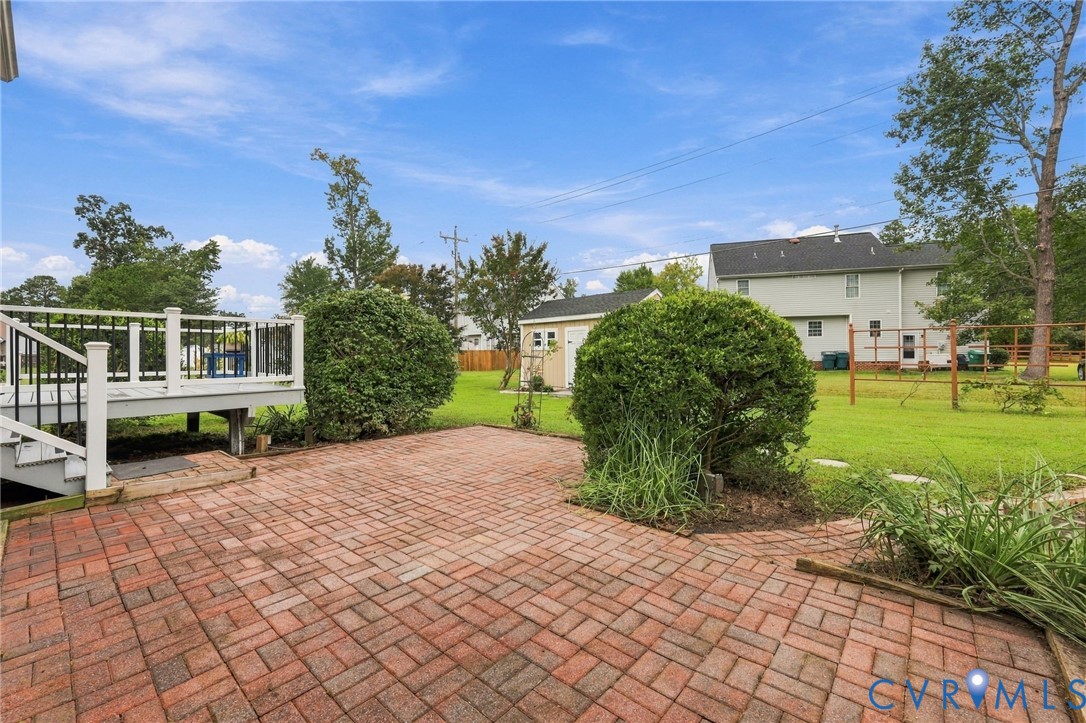 244 East Huntsman Road Sandston, VA 23150 - Photo 49 of 54 Expansive backyard featuring a brick paver patio,