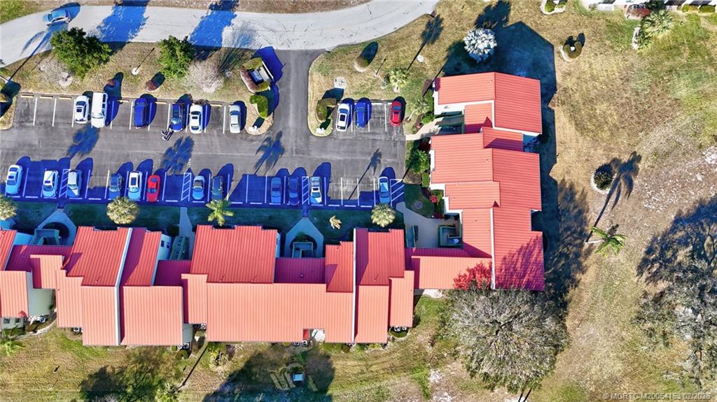 5413 Southeast Miles Grant Road, Unit G206 Stuart, FL 34997 - Photo 68 of 79 an aerial view of multiple houses