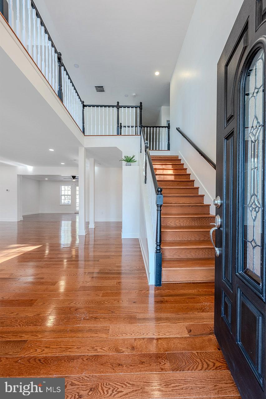 12300 Braddock Road Fairfax, VA 22030 - Photo 14 of 70 a view of entryway and hall with wooden floor