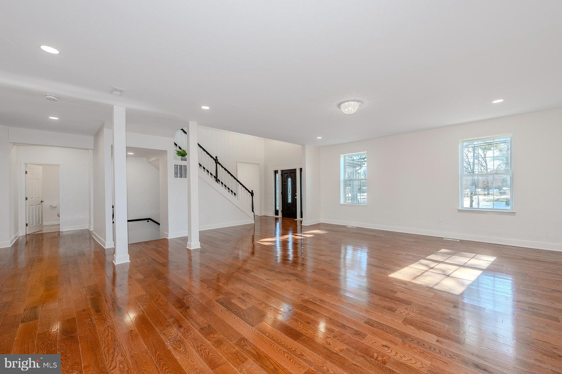 12300 Braddock Road Fairfax, VA 22030 - Photo 17 of 70 a view of empty room with wooden floor and window