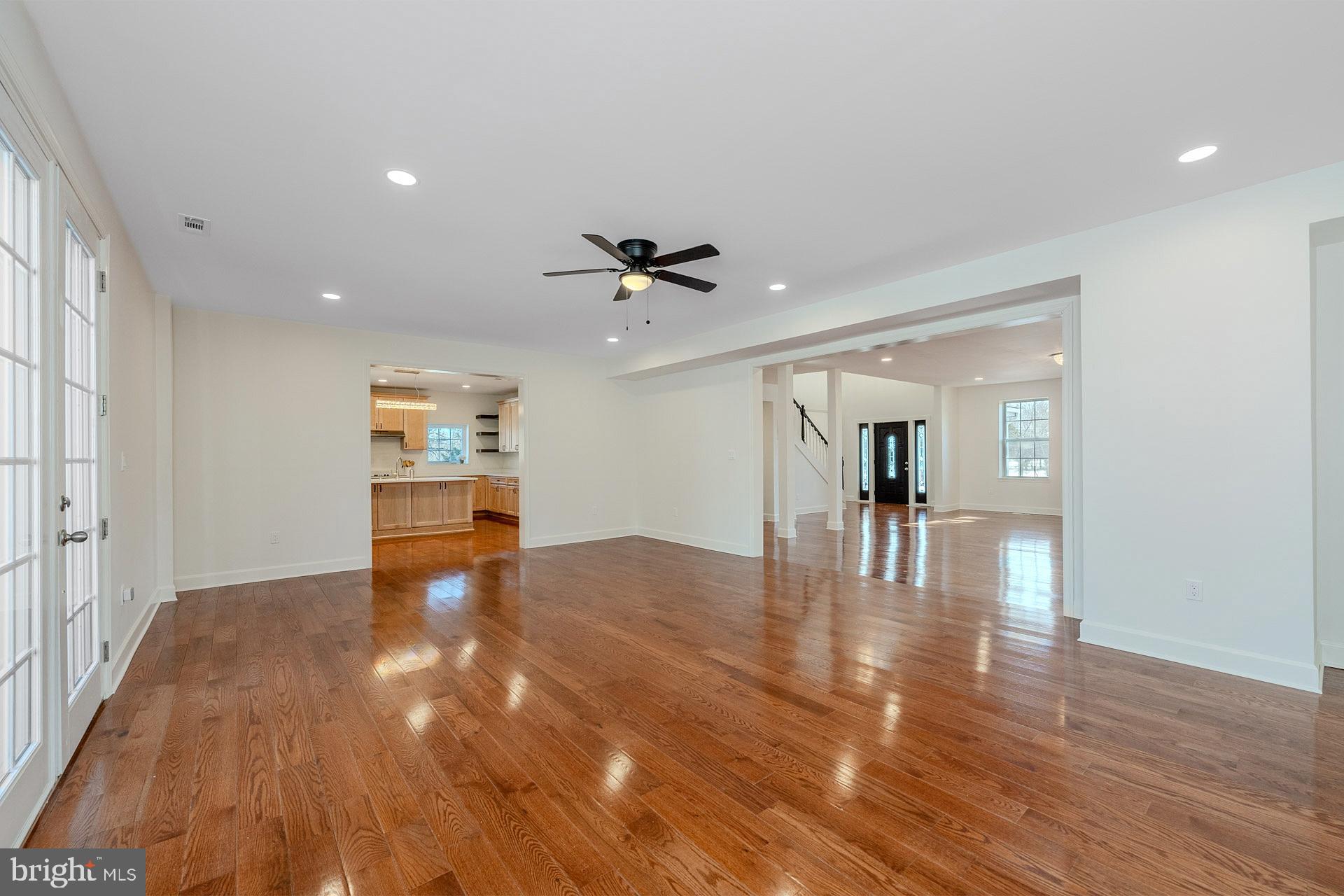 12300 Braddock Road Fairfax, VA 22030 - Photo 18 of 70 a view of livingroom with hardwood floor and a ceiling fan