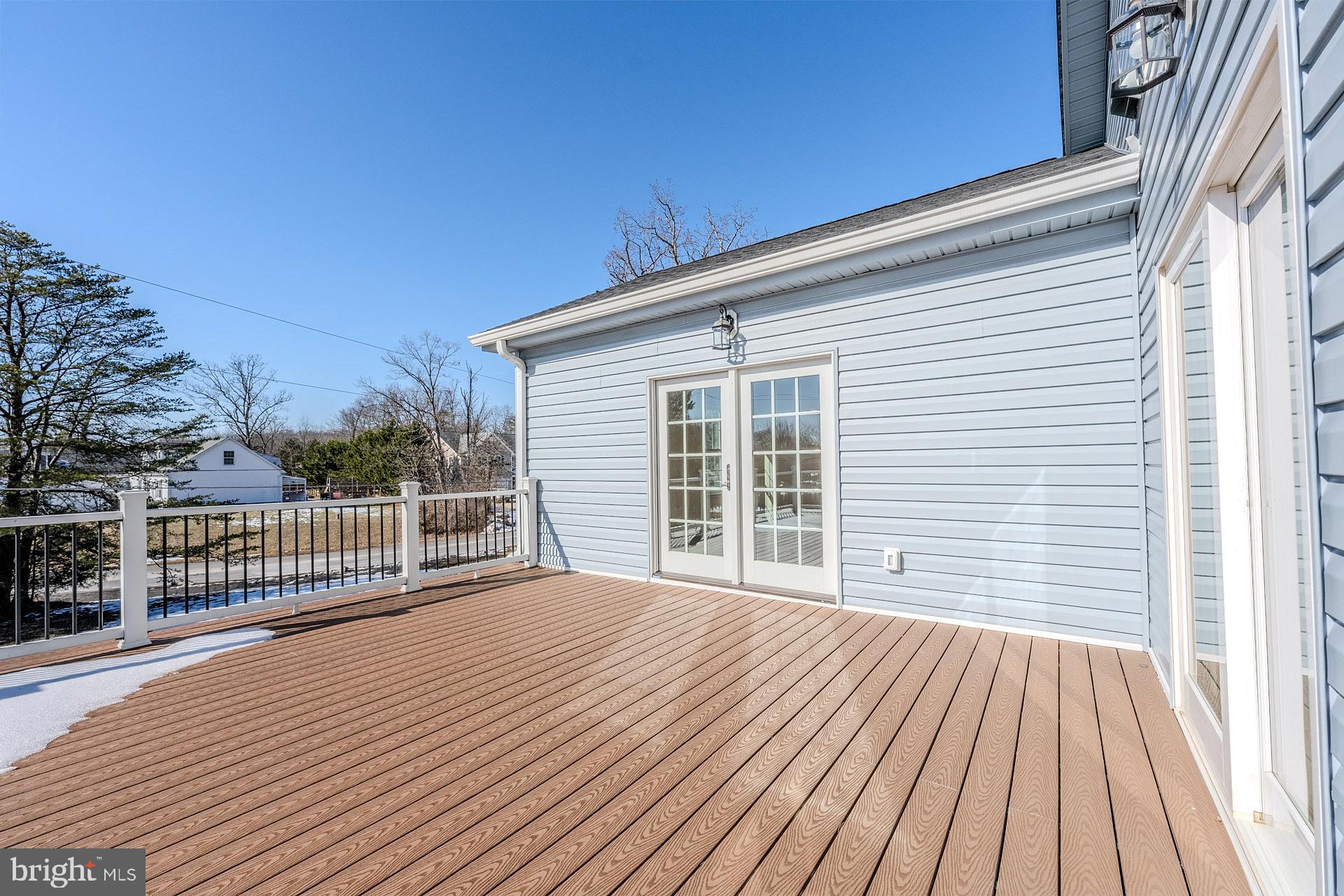 12300 Braddock Road Fairfax, VA 22030 - Photo 38 of 70 a view of backyard with deck and wooden floor