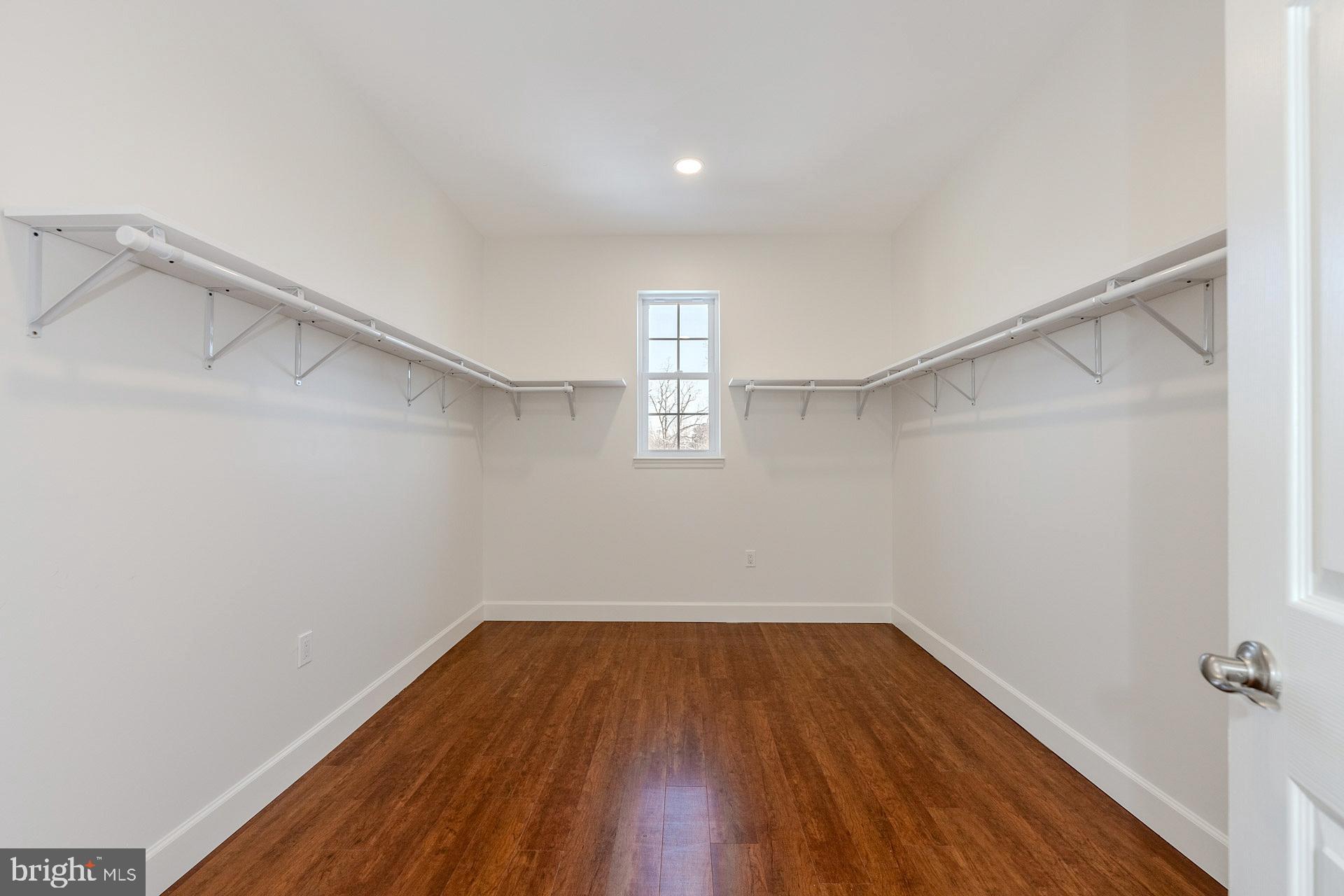 12300 Braddock Road Fairfax, VA 22030 - Photo 44 of 70 a view of a room with wooden floor and window