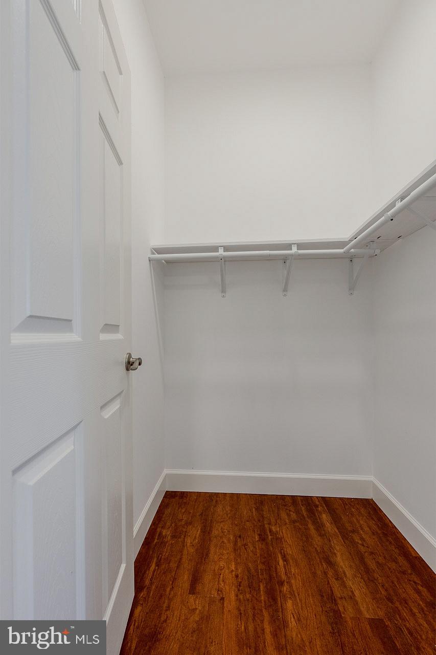 12300 Braddock Road Fairfax, VA 22030 - Photo 54 of 70 a view of a room with wooden floor