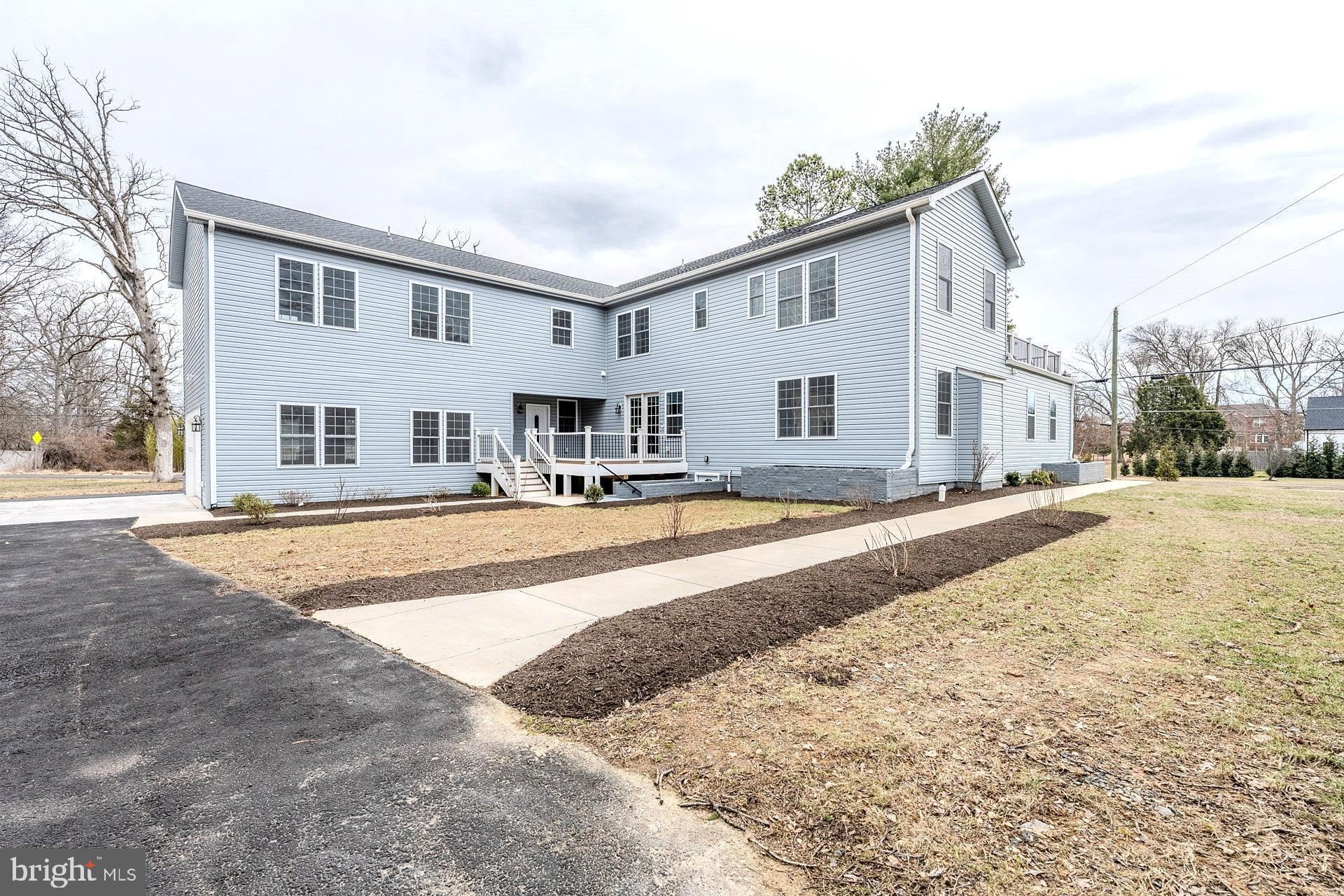 12300 Braddock Road Fairfax, VA 22030 - Photo 66 of 70 a swimming pool with outdoor seating and yard