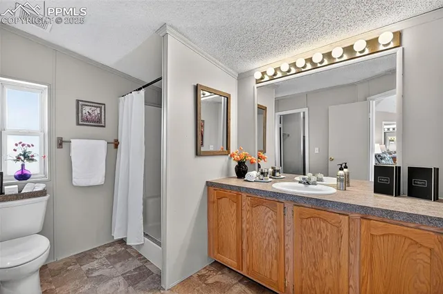 a bathroom with a sink and a toilet