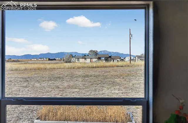 a view of a big room with an ocean view