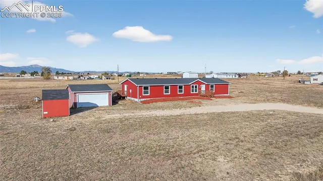 a view of a road with an ocean view