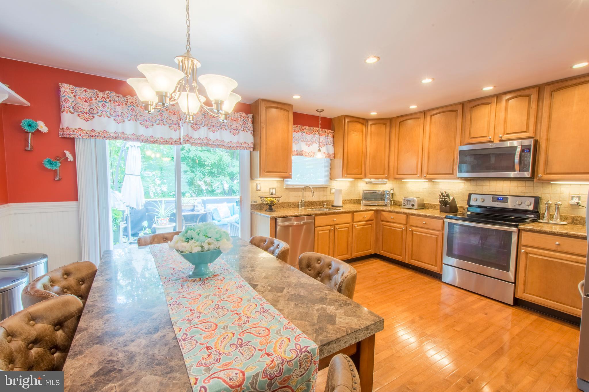 506 Tulip Road Riva, MD 21140 - Photo 2 of 56 Open Kitchen With Hardwood Floor