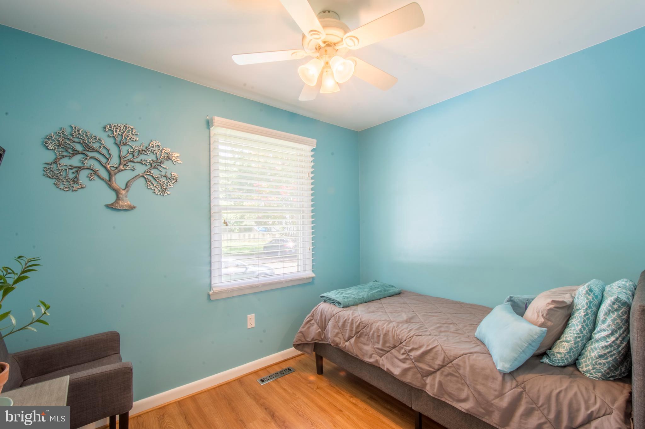 506 Tulip Road Riva, MD 21140 - Photo 23 of 56 Second Bedroom With Hardwood Floor And Ceiling Fan
