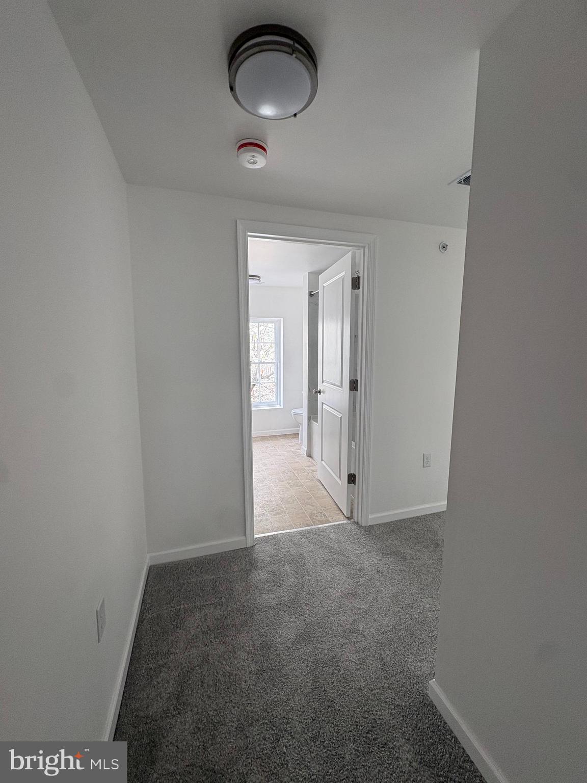 104 West All Saints Street, Unit C2 Frederick, MD 21701 - Photo 14 of 19 an empty room with windows