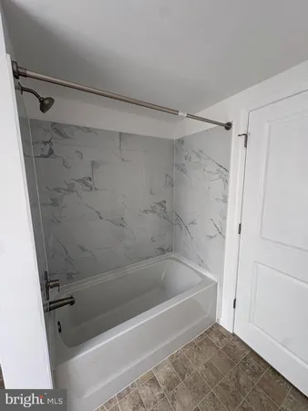 a view of a sink and a mirror