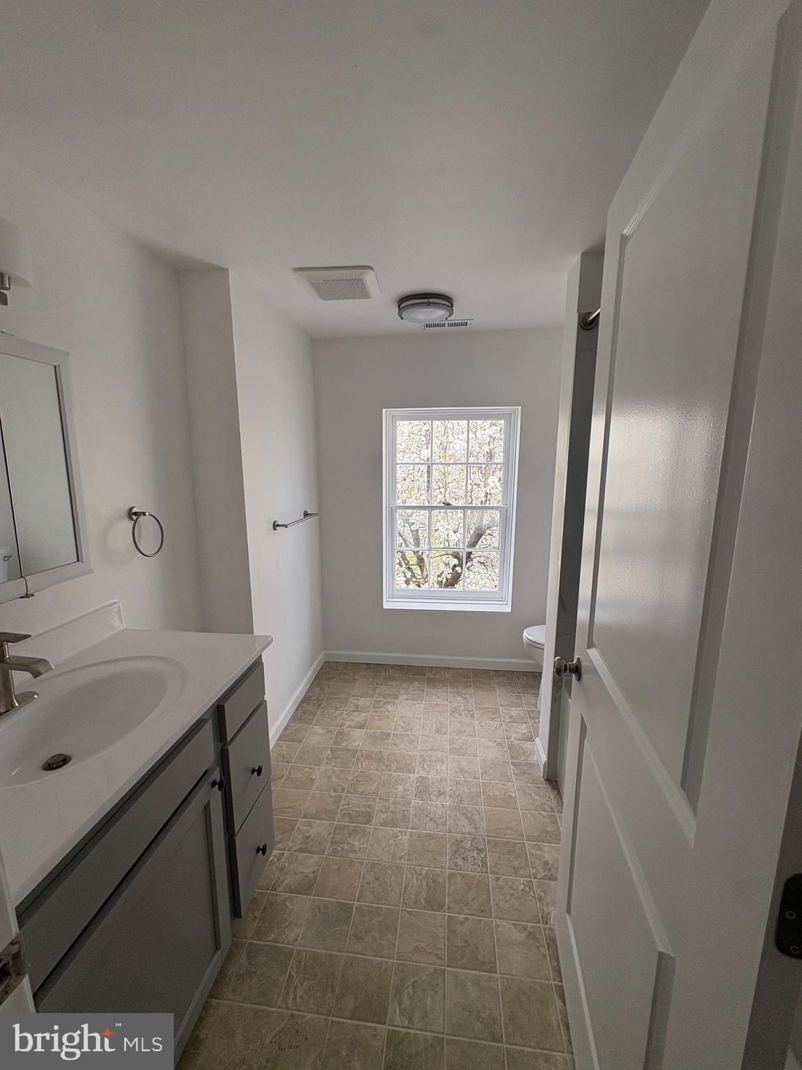 104 West All Saints Street, Unit C2 Frederick, MD 21701 - Photo 16 of 19 a view of a sink and a mirror