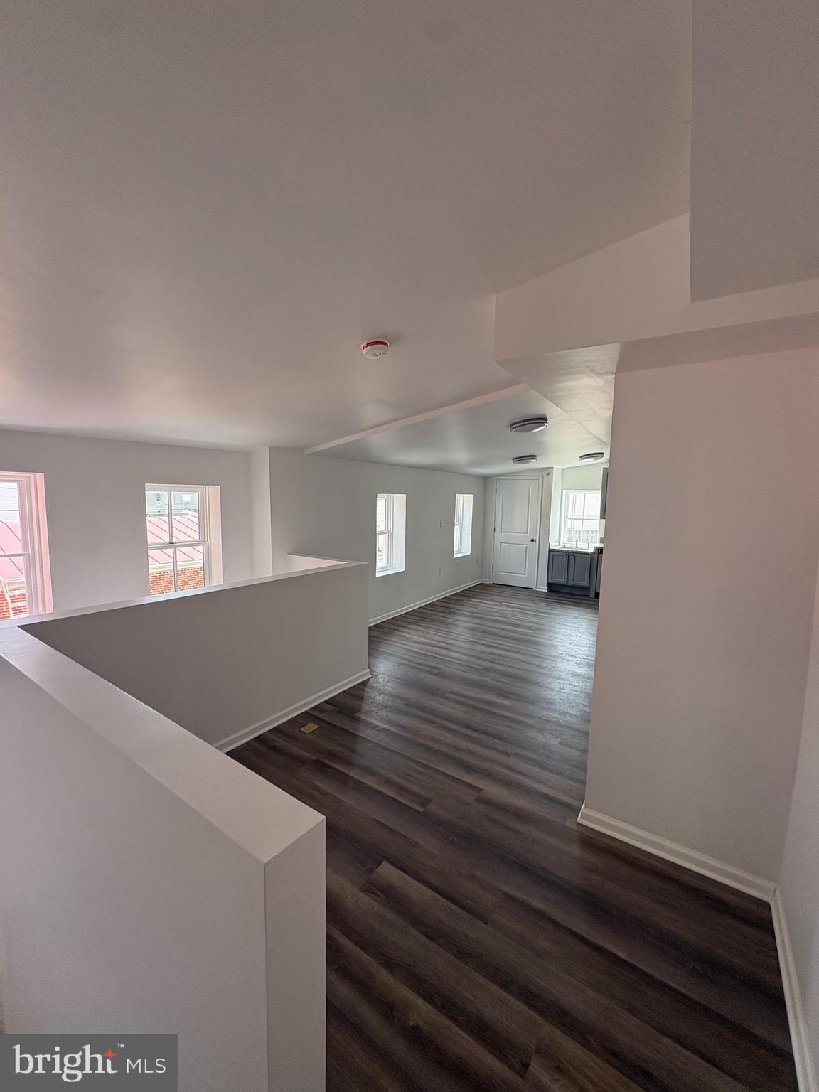 104 West All Saints Street, Unit C2 Frederick, MD 21701 - Photo 8 of 19 a view of empty room with wooden floor