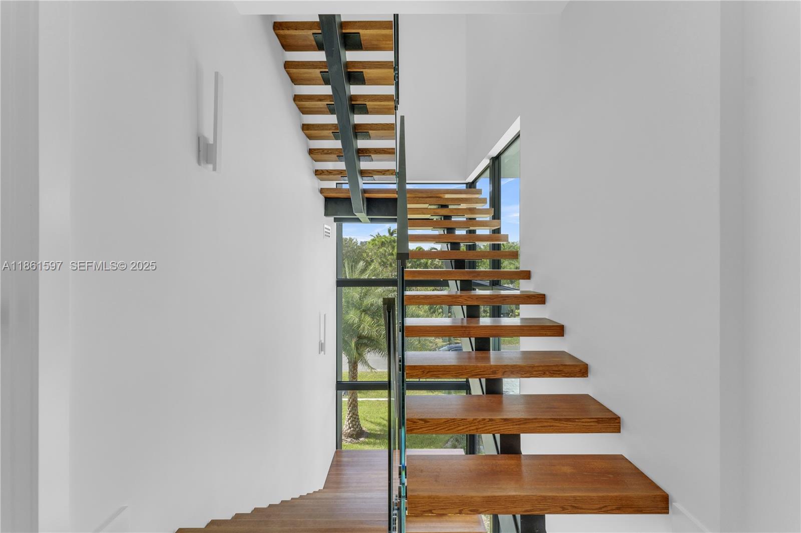 3205 Leigh Road Pompano Beach, FL 33062 - Photo 27 of 49 1st floor leading to 2nd floor