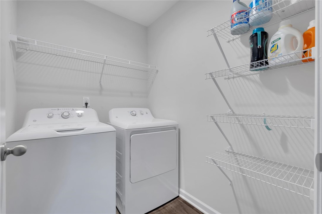 215 Royal Way Pendleton, SC 29670 - Photo 22 of 33 This dedicated laundry space combines practicality with smart storage solutions.
