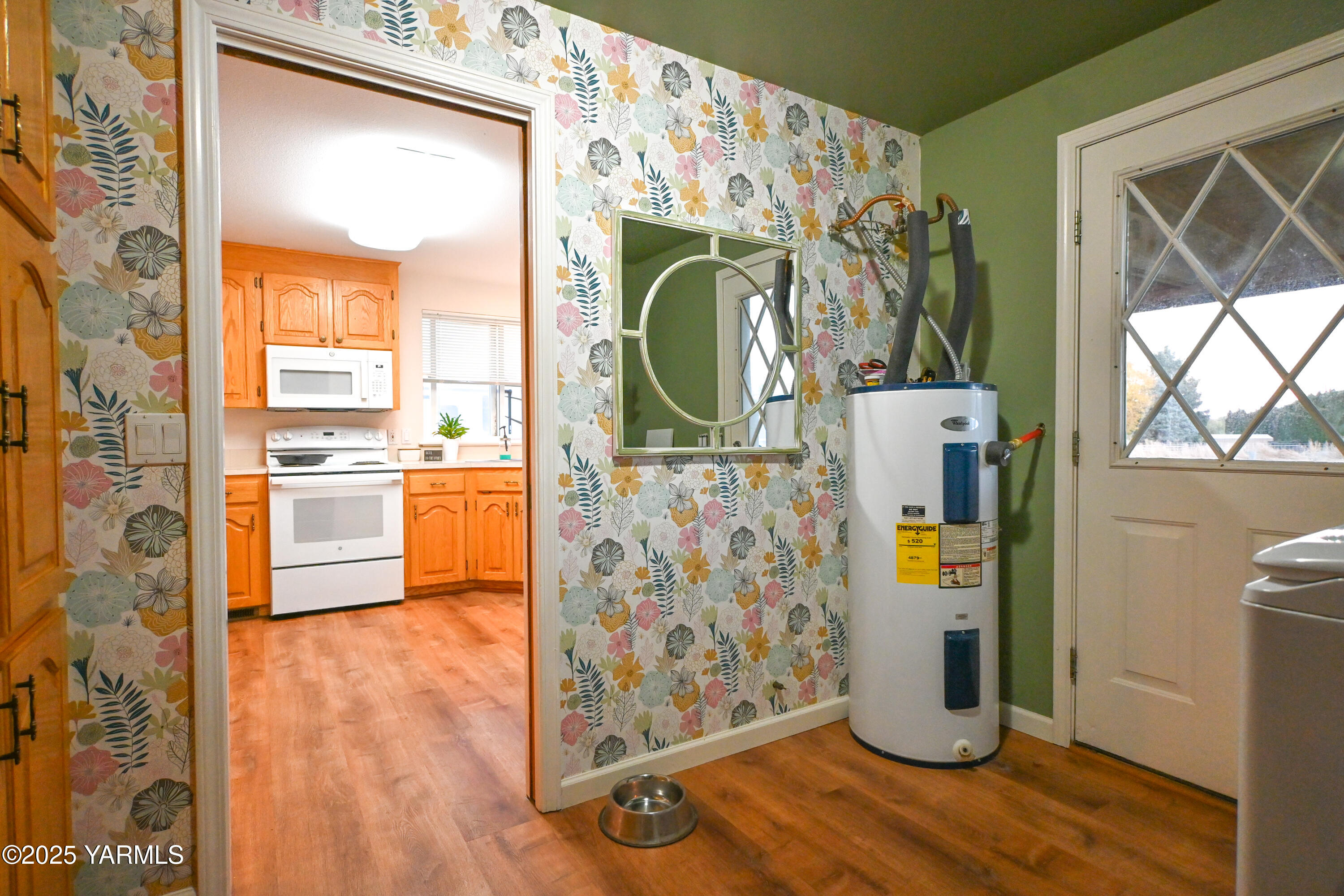 9621 Meadowbrook Road Yakima, WA 98903 - Photo 11 of 41 a view of a entryway door with wooden floor