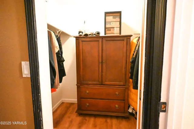 a view of furniture and window in a room
