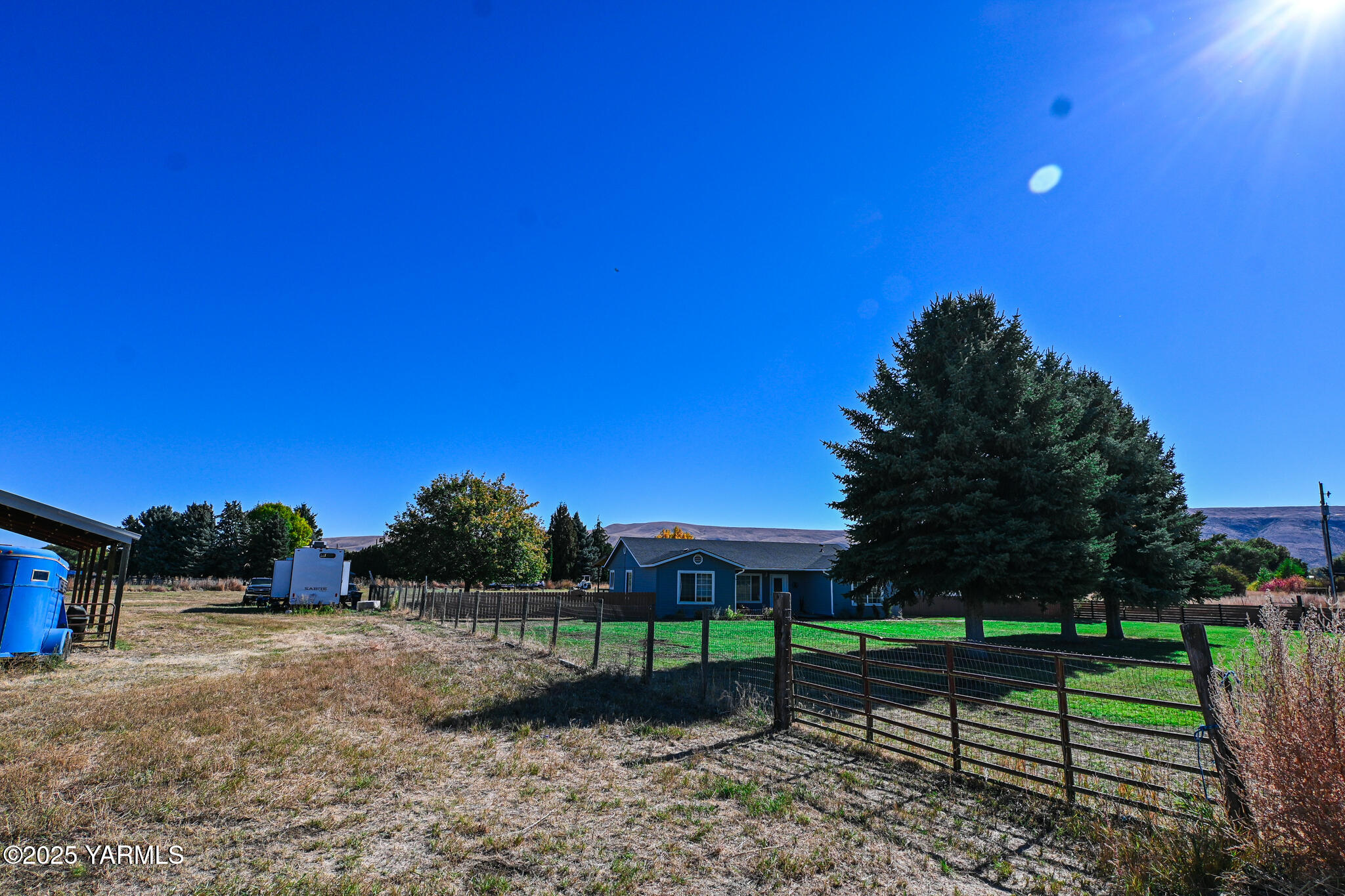 9621 Meadowbrook Road Yakima, WA 98903 - Photo 24 of 41 a green field with trees in the background