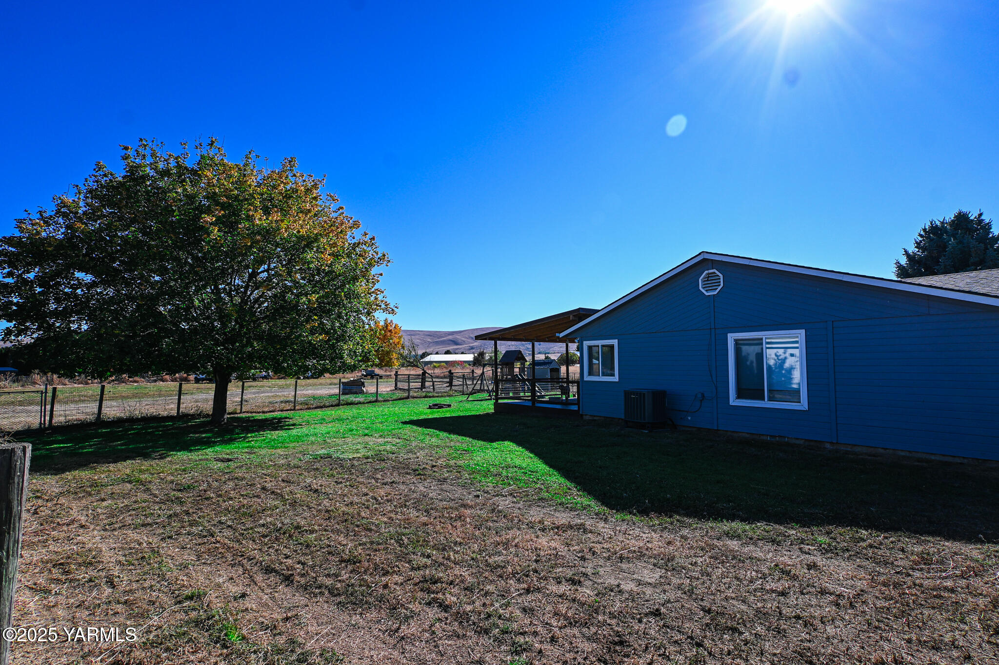 9621 Meadowbrook Road Yakima, WA 98903 - Photo 35 of 41 a view of a house with a yard