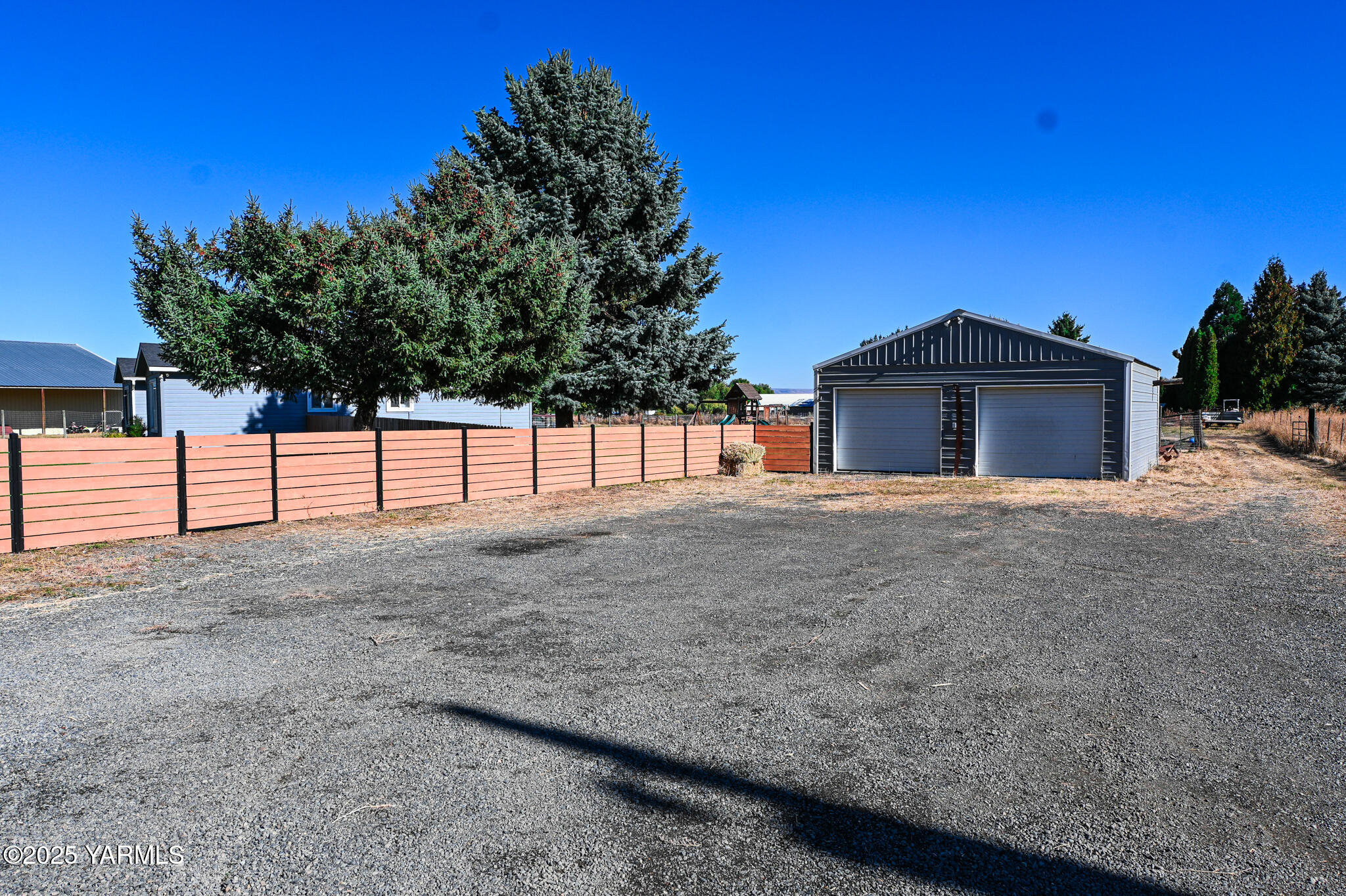 9621 Meadowbrook Road Yakima, WA 98903 - Photo 39 of 41 a view of a house with a backyard