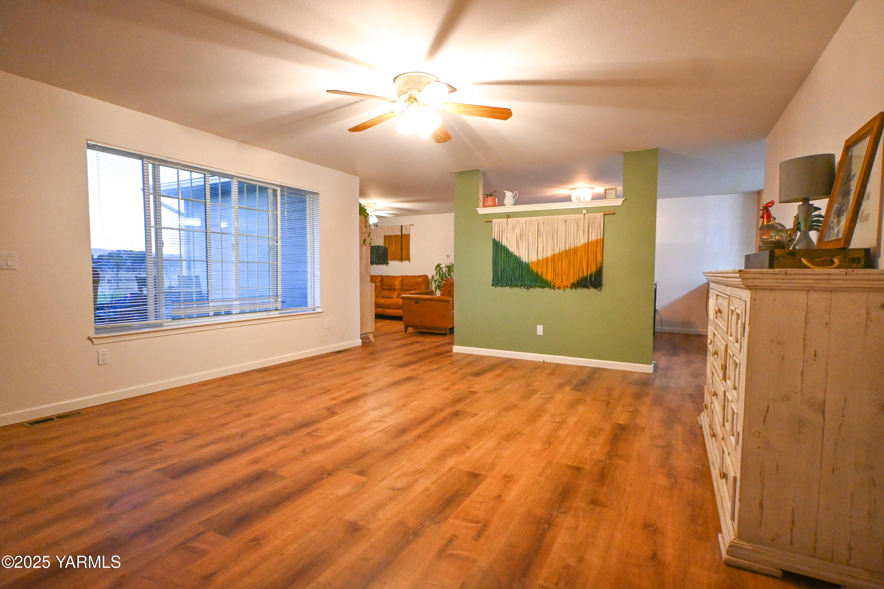 9621 Meadowbrook Road Yakima, WA 98903 - Photo 6 of 41 a view of an empty room with a window