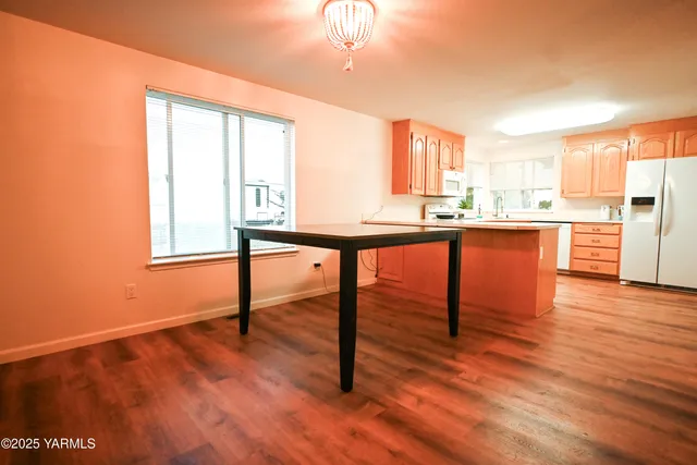 a room with lots of counter top space and a window