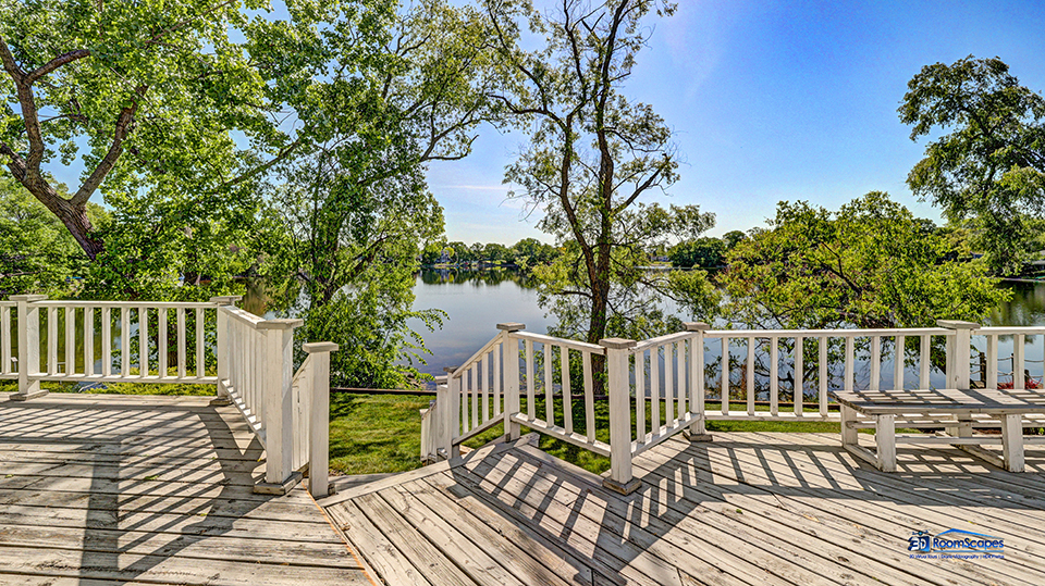 2276 High Point Drive Lindenhurst, IL 60046 - Photo 13 of 15 a view of a wooden deck with a bench