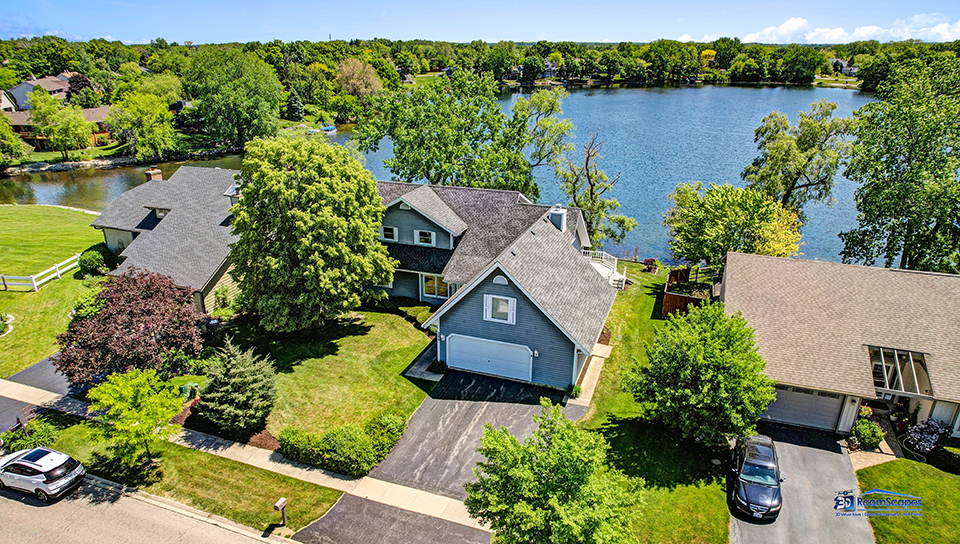 2276 High Point Drive Lindenhurst, IL 60046 - Photo 2 of 15 an aerial view of house with yard and lake view