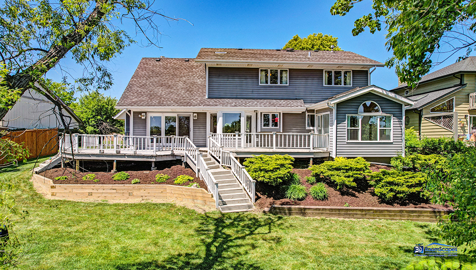 2276 High Point Drive Lindenhurst, IL 60046 - Photo 3 of 15 a front view of a house with a yard table and chairs