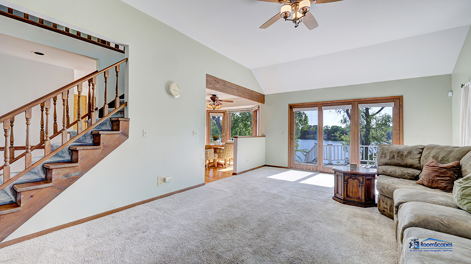 2276 High Point Drive Lindenhurst, IL 60046 - Photo 5 of 15 a living room with furniture and a floor to ceiling window