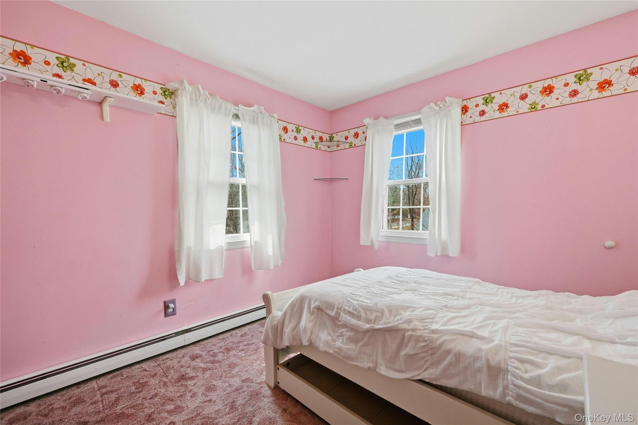 41 North Country Road Shoreham, NY 11786 - Photo 16 of 31 Bedroom with two windows