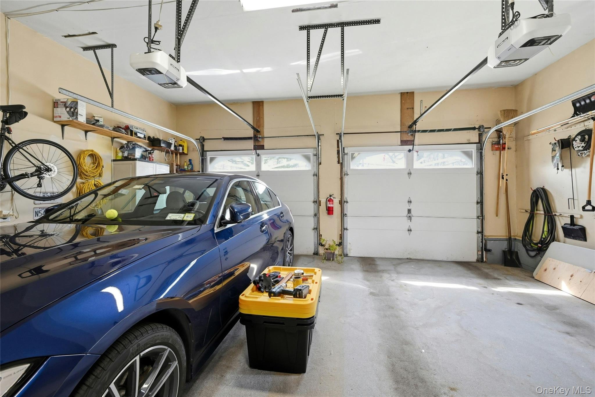 41 North Country Road Shoreham, NY 11786 - Photo 18 of 31 Garage with automatic door openers, access to basement and door to backyard.