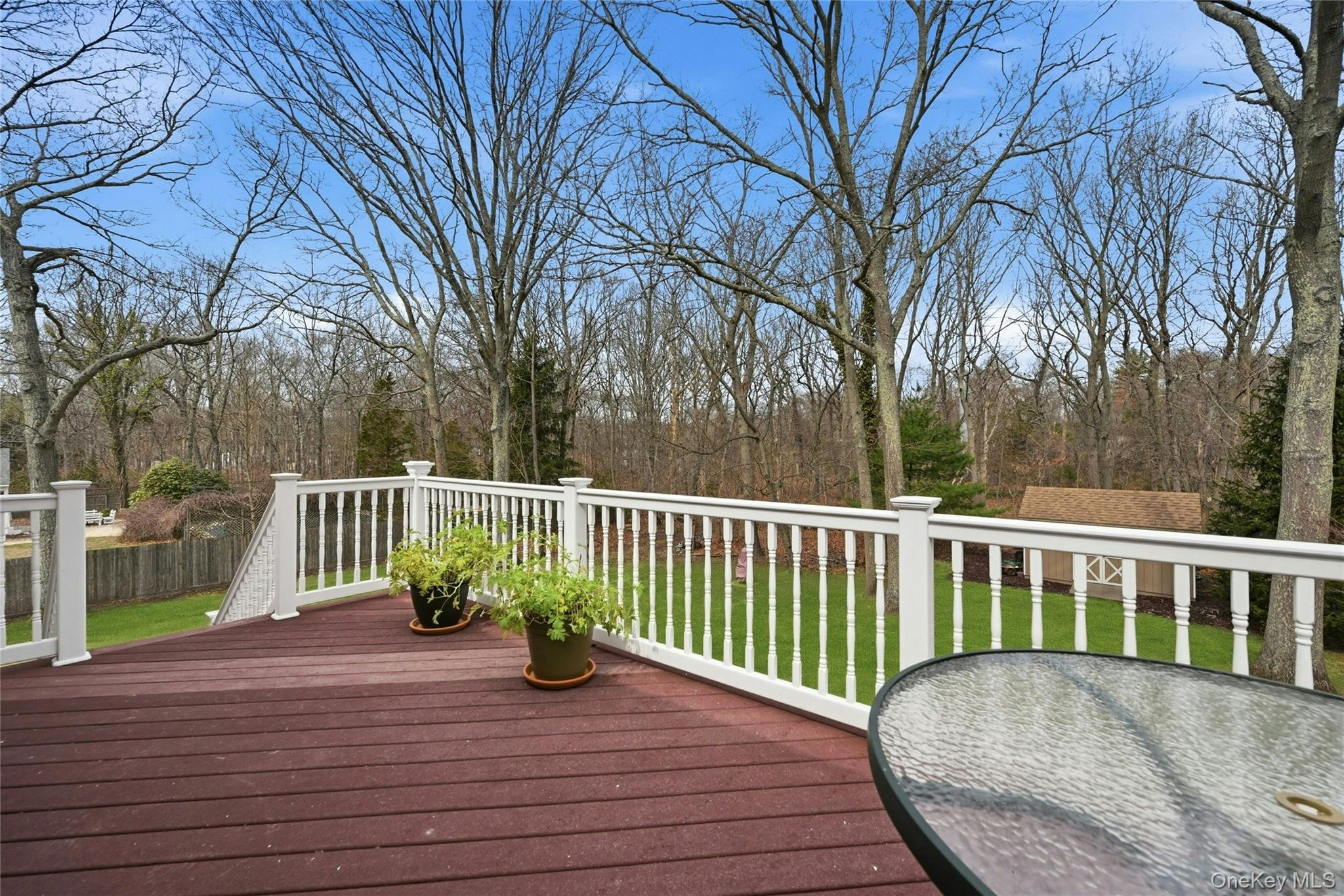 41 North Country Road Shoreham, NY 11786 - Photo 19 of 31 Upper deck with staircase to lower level