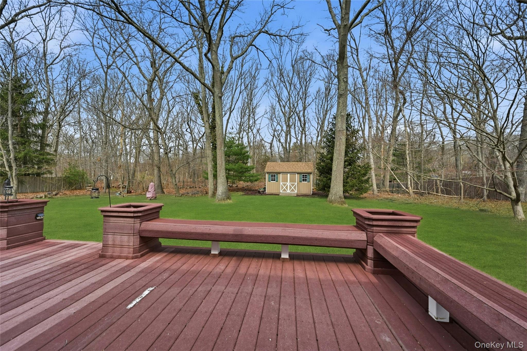 41 North Country Road Shoreham, NY 11786 - Photo 20 of 31 Lower Deck with built in seating and planter boxes.