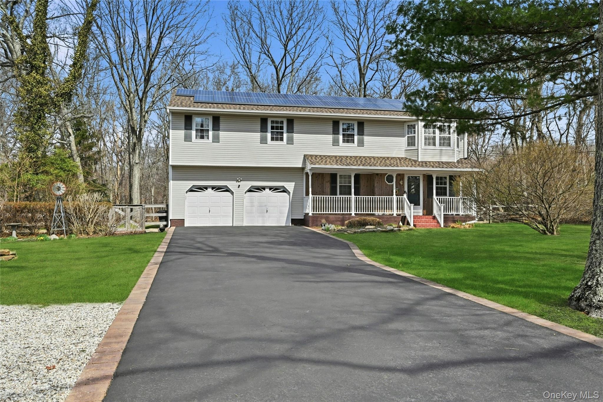 41 North Country Road Shoreham, NY 11786 - Photo 2 of 31 Long Driveway with paver trim