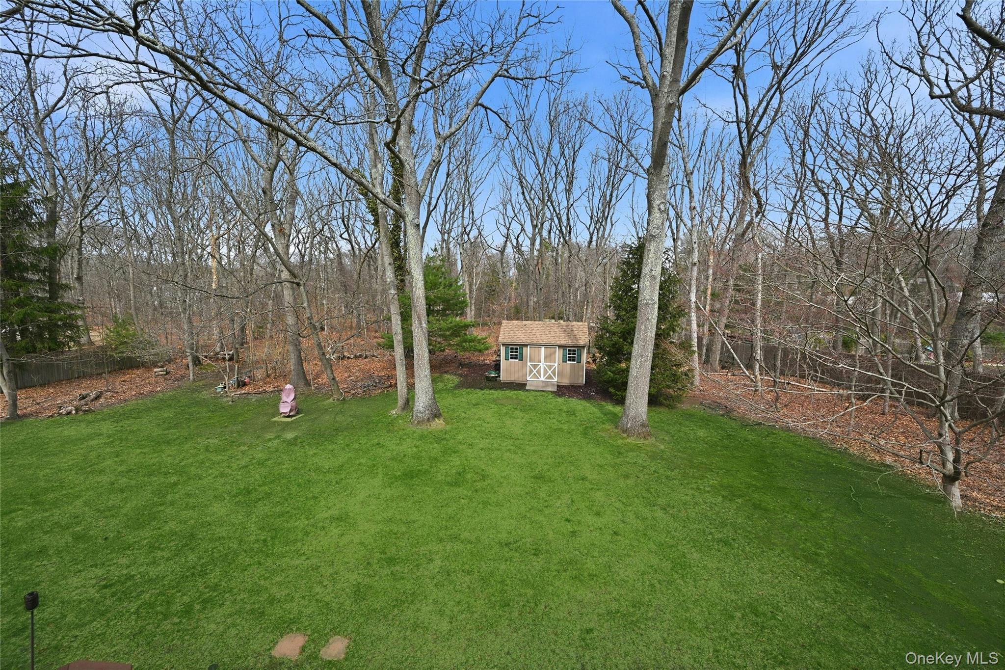 41 North Country Road Shoreham, NY 11786 - Photo 23 of 31 View of the back lawn